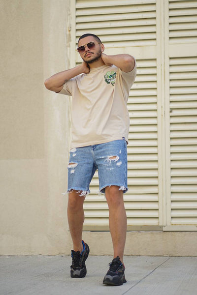 Cremefarbenes Oversize-T-Shirt mit Totenkopf-Stickerei